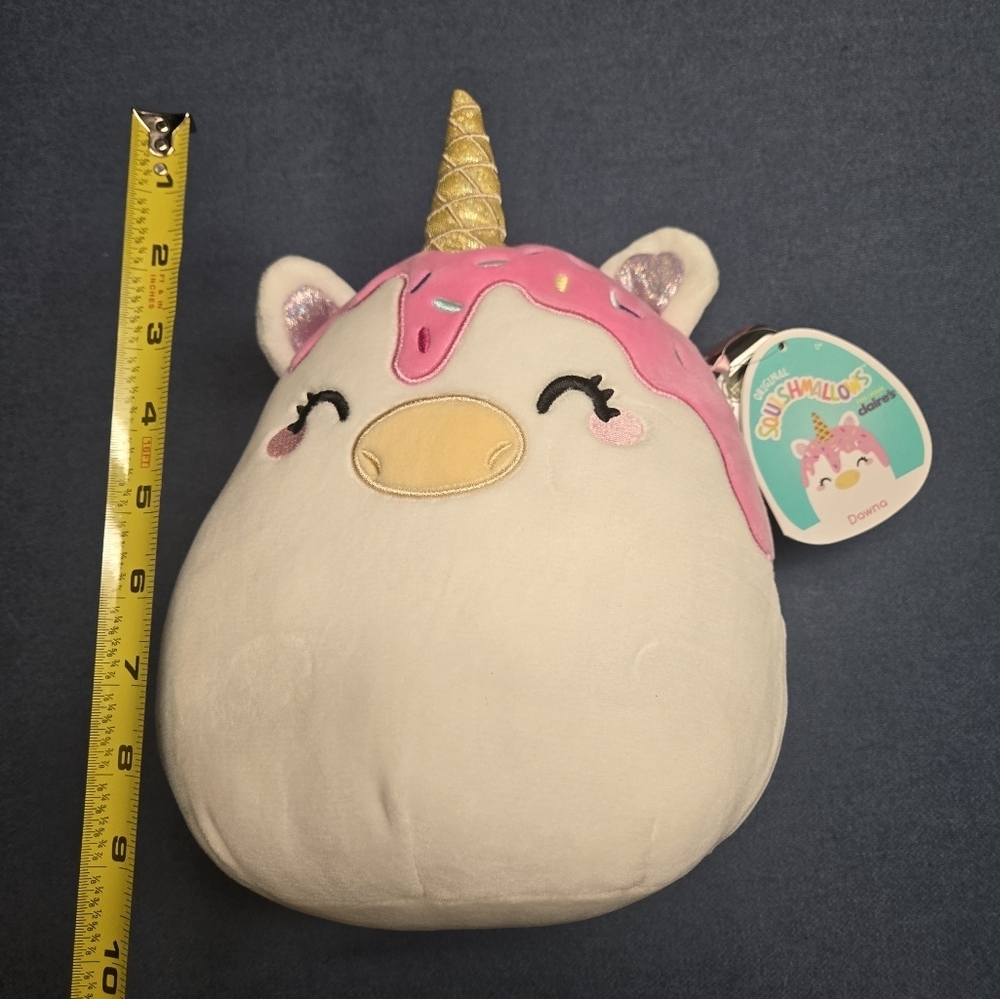 NWT Dawna the 8" Melty Unicorn is a white Squishmallow exclusive to Claire's.